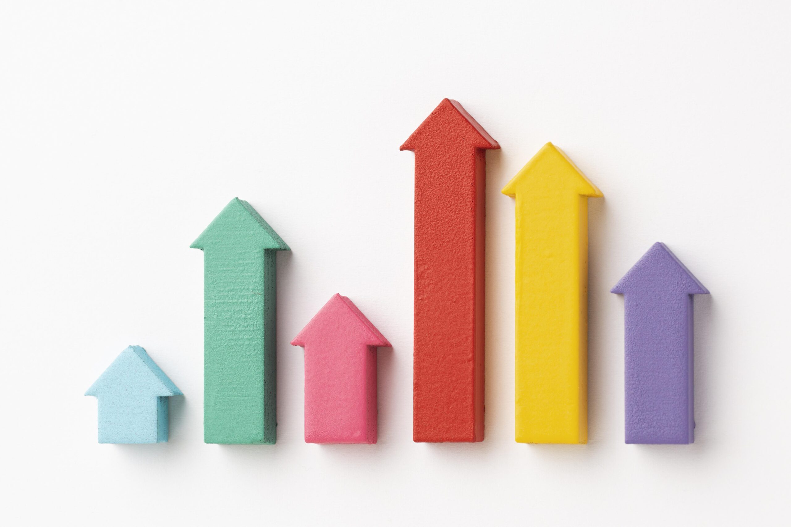 flat lay statistics presentation with chart arrows