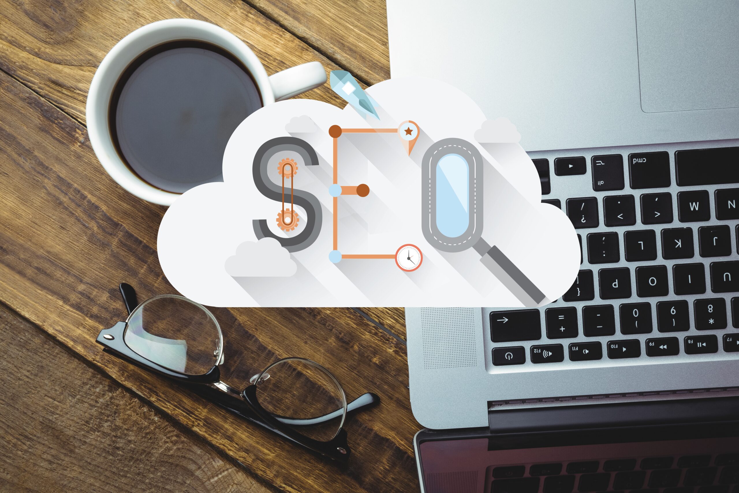 digital composite of coffee with laptop and seo graphics